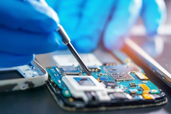 Technician repairing a device